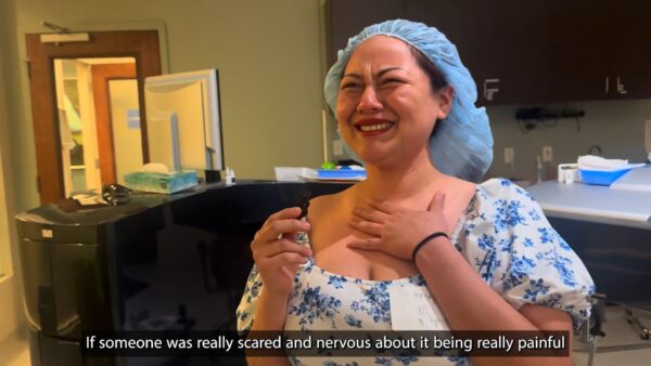 Wendy celebrating clearer vision and newfound freedom after LASIK surgery